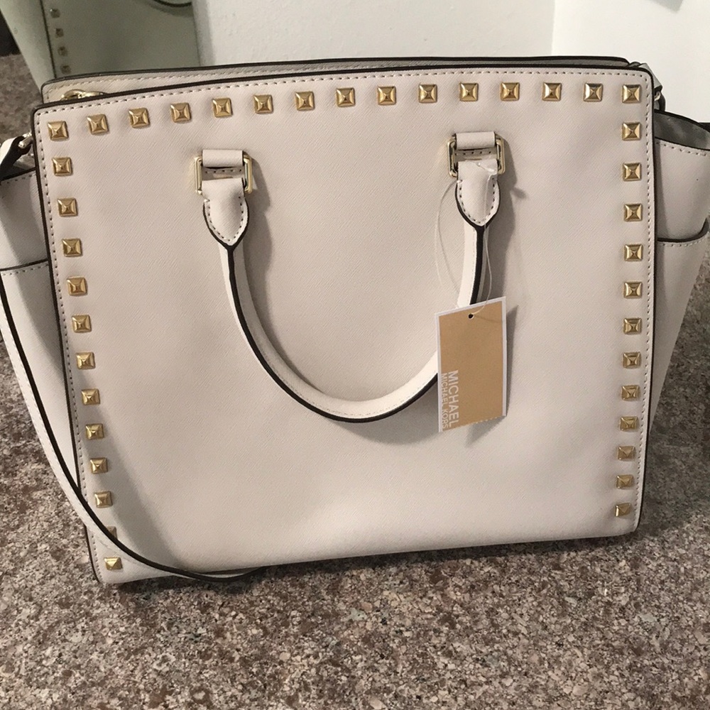 Authentic Michael Kors bag with gold studs